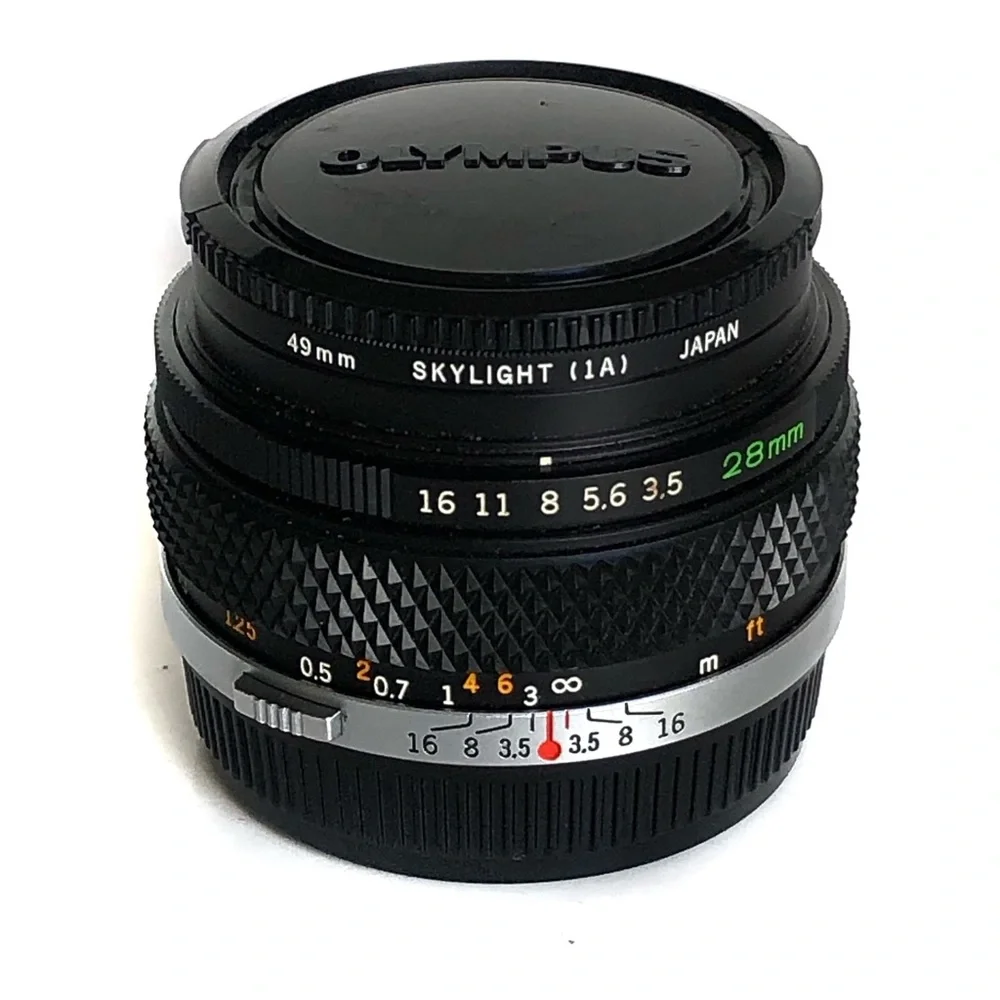 Olympus OM-System G.Zuiko Auto-W 28mm f/3.5 Wide Angle Lens Skylight Filter Case
